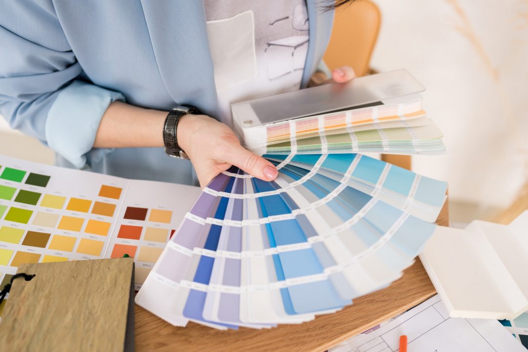 close-up-of-architect-woman-choosing-samples-of-wall-paint-.jpg
